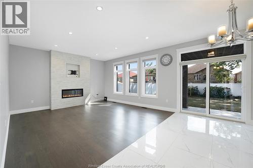 1581 Rockport, Windsor, ON - Indoor Photo Showing Living Room With Fireplace