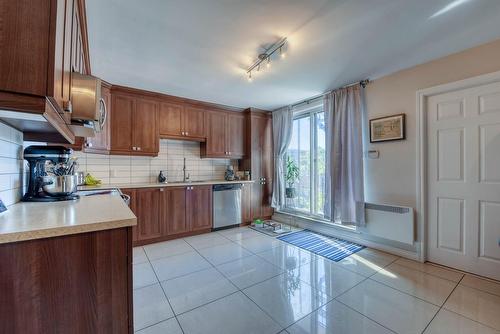 Cuisine - 7294  - 7298 Av. Christophe-Colomb, Montréal (Villeray/Saint-Michel/Parc-Extension), QC - Indoor Photo Showing Kitchen With Double Sink