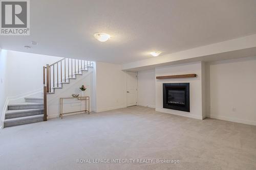713 Teasel Way, Ottawa, ON - Indoor With Fireplace