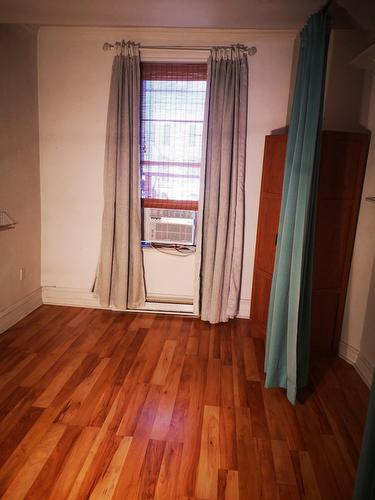 Primary bedroom - 1-977 Rue St-André, Montréal (Ville-Marie), QC - Indoor Photo Showing Other Room