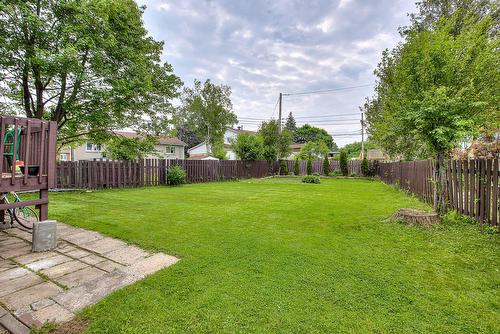 Cour - 15 Rue Ash, Dollard-Des-Ormeaux, QC - Outdoor With Backyard