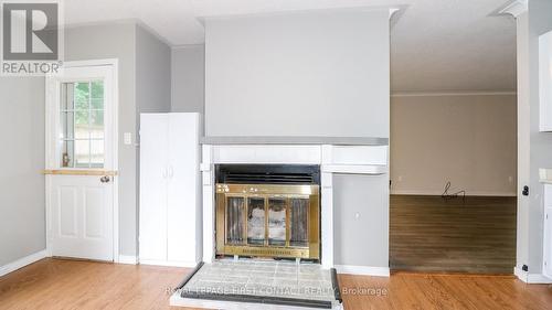 24 Howard Avenue, Tiny, ON - Indoor Photo Showing Other Room With Fireplace