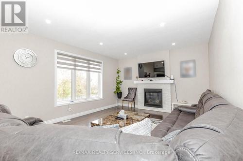 263 Wedgewood Drive, Woodstock, ON - Indoor Photo Showing Living Room With Fireplace