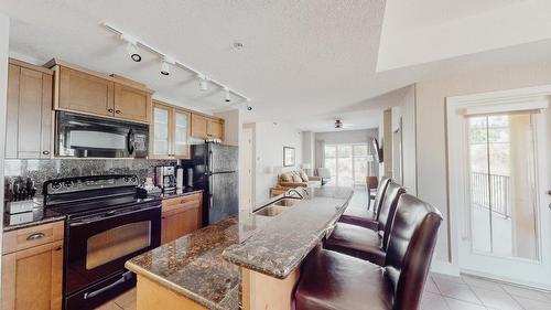 128A-1200 Rancher Creek Road, Osoyoos, BC - Indoor Photo Showing Kitchen With Double Sink