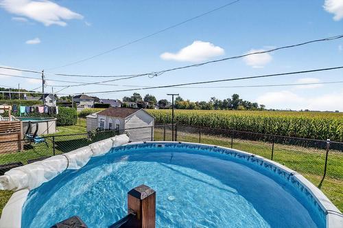 Piscine - 154 Rue Forest, Saint-Sulpice, QC - Outdoor With Above Ground Pool With Backyard