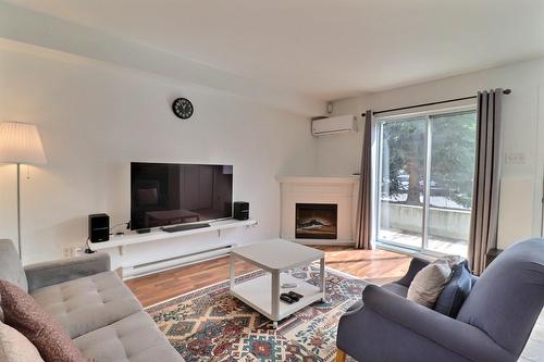 Salon - 2-94 Rue Du Stratus, Gatineau (Hull), QC - Indoor Photo Showing Living Room With Fireplace