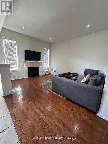 Upper - 70 Boundbrook Drive, Brampton, ON - Indoor Photo Showing Living Room With Fireplace