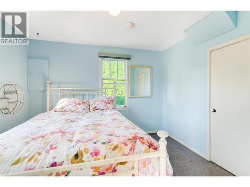 1060 Tataryn Road, Kelowna, BC - Indoor Photo Showing Bedroom