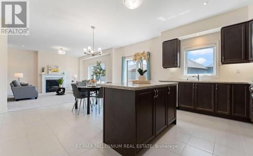 30 Rowley Street, Brantford, ON - Indoor Photo Showing Kitchen With Fireplace