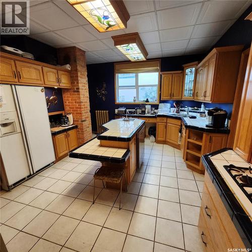 313 19Th Street W, Prince Albert, SK - Indoor Photo Showing Kitchen With Double Sink