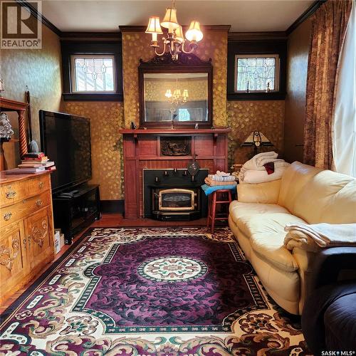 313 19Th Street W, Prince Albert, SK - Indoor Photo Showing Living Room With Fireplace