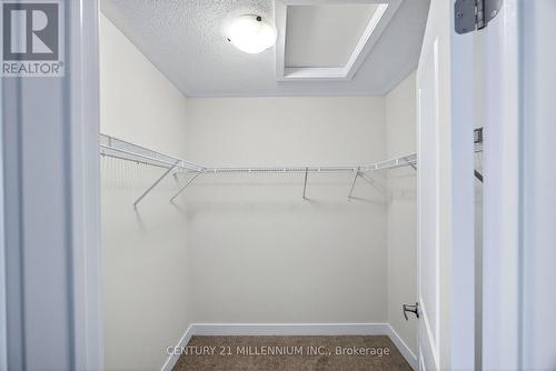 Primary walk-in closet - 102 Walden Drive, Shelburne, ON - Indoor With Storage
