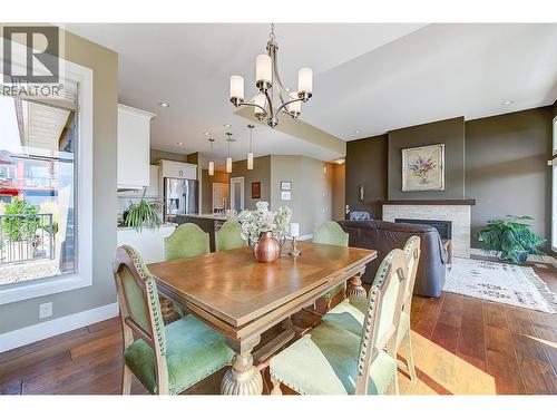 2133 Talavera Place, West Kelowna, BC - Indoor Photo Showing Dining Room With Fireplace