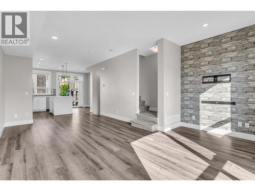 Living / Dining Room - 13098 Shoreline Way Unit# 38, Lake Country, BC - Indoor With Fireplace