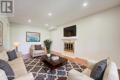257 Huntington Ridge Drive, Mississauga, ON - Indoor Photo Showing Living Room With Fireplace