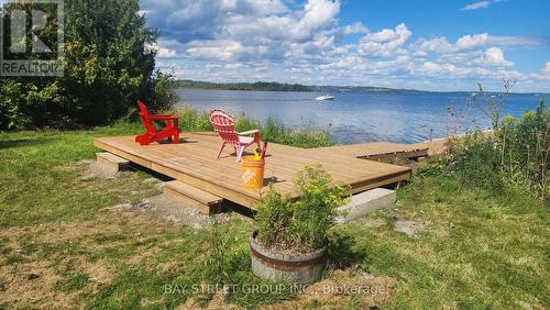 5173 Rice Lake Drive N, Hamilton Township, ON - Outdoor With Body Of Water With Deck Patio Veranda With View