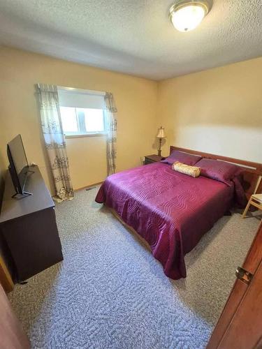 103080 Pth 5 Highway, Riding Mountain, MB - Indoor Photo Showing Bedroom