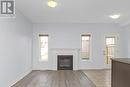 79 Sonoma Valley Crescent, Hamilton, ON  - Indoor Photo Showing Living Room With Fireplace 