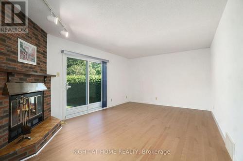 82 Nestow Drive, Ottawa, ON - Indoor Photo Showing Other Room With Fireplace