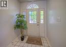 Entrance foyer with light tile patterned floors and a textured ceiling - 310 Christopher Drive Unit# 15, Cambridge, ON  - Indoor Photo Showing Other Room 