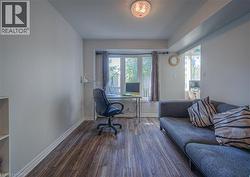 Dining Room with baseboards and dark wood-style flooring - 