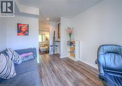 Dining Room featuring dark wood-style floors and baseboards - 