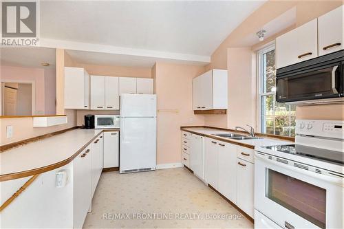 1 - 19 Main Street, Westport, ON - Indoor Photo Showing Kitchen With Double Sink