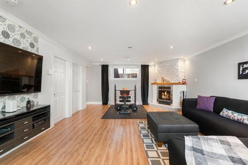 Family room - 13382 Rue St-Michel, Mirabel, QC - Indoor Photo Showing Living Room With Fireplace
