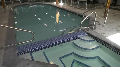 12-415 Commonwealth Road, Kelowna, BC - Indoor Photo Showing Other Room With In Ground Pool