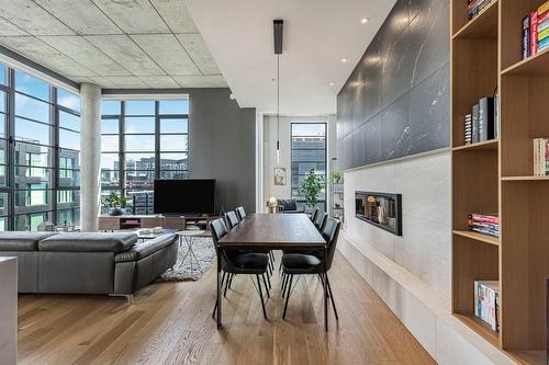 Dining room - Ph2-1-1330 Rue Olier, Montréal (Le Sud-Ouest), QC - Indoor Photo Showing Other Room With Fireplace