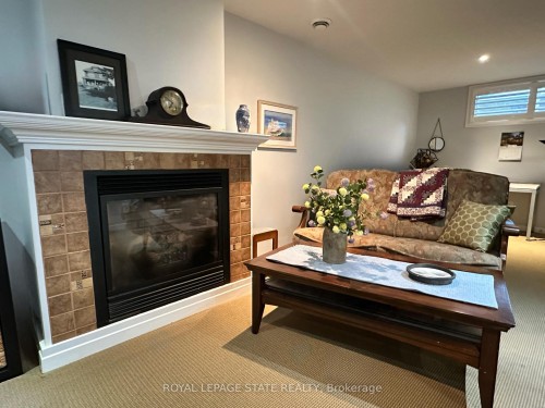 102 Jarrett Place, Haldimand, ON - Indoor Photo Showing Living Room With Fireplace