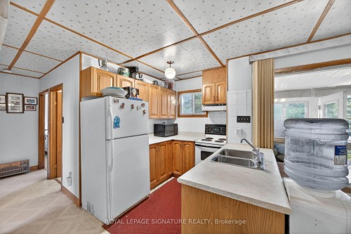 81-77 Bass Bay Drive, Tay, ON - Indoor Photo Showing Kitchen With Double Sink