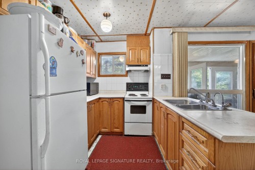 81-77 Bass Bay Drive, Tay, ON - Indoor Photo Showing Kitchen With Double Sink