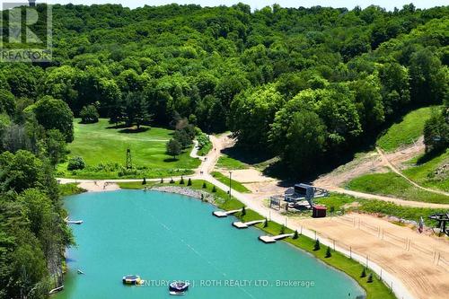 Condo fees include the use of Horseshoe amenities. - 406 - 80 Horseshoe Boulevard, Oro-Medonte, ON - Outdoor With Body Of Water