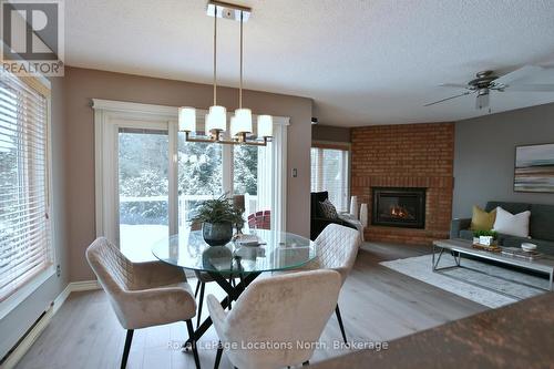 153 - 30 Ramblings Way, Collingwood, ON - Indoor Photo Showing Other Room With Fireplace