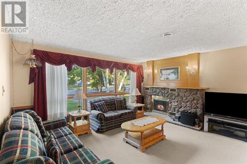 35 Pine Tree Road, Gambo, NL - Indoor Photo Showing Living Room With Fireplace
