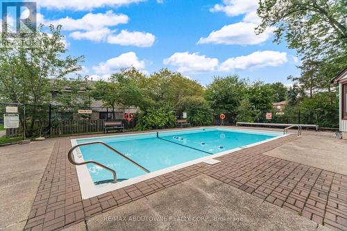 106 - 2779 Gananoque Drive, Mississauga, ON - Outdoor With In Ground Pool