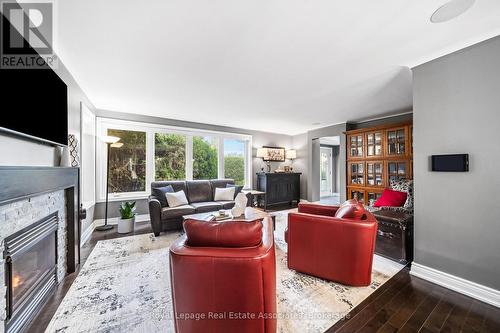 96 Delrex Boulevard, Halton Hills, ON - Indoor Photo Showing Living Room With Fireplace
