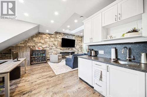 96 Delrex Boulevard, Halton Hills, ON - Indoor Photo Showing Kitchen With Fireplace