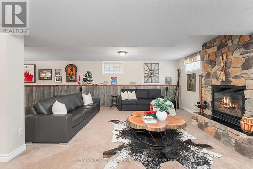 Relax and enjoy - 61 Broadview Street, Collingwood, ON - Indoor Photo Showing Living Room With Fireplace
