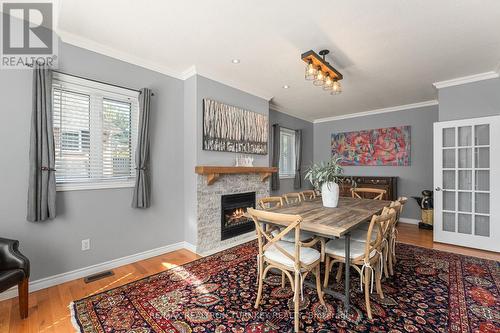 Perfect for hosting guests and family - 61 Broadview Street, Collingwood, ON - Indoor Photo Showing Dining Room With Fireplace