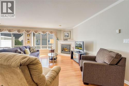 5700 Blackwell Sideroad Unit# 328, Sarnia, ON - Indoor Photo Showing Living Room With Fireplace