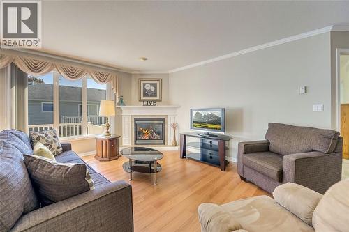 5700 Blackwell Sideroad Unit# 328, Sarnia, ON - Indoor Photo Showing Living Room With Fireplace