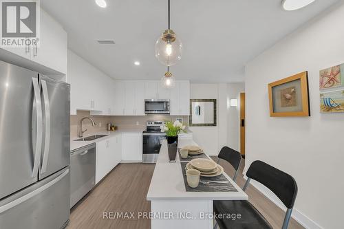 309 - 121 Mary Street, Clearview, ON - Indoor Photo Showing Kitchen With Double Sink