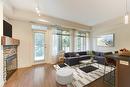 209-3521 Carrington Road, West Kelowna, BC  - Indoor Photo Showing Living Room With Fireplace 