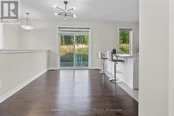 Dining room with patio door and scenic view. - 