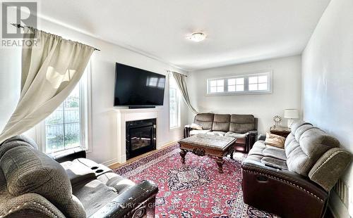 21 Tupling Street, Bradford West Gwillimbury, ON - Indoor Photo Showing Living Room With Fireplace