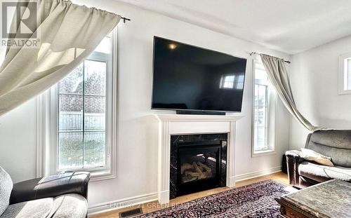 21 Tupling Street, Bradford West Gwillimbury, ON - Indoor Photo Showing Living Room With Fireplace