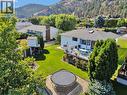 A family home with a great yard - perfect for growing children - 325 Mctavish Road, Kelowna, BC  - Outdoor With Deck Patio Veranda 