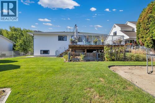 Lots of flat space for kids to play - 325 Mctavish Road, Kelowna, BC - Outdoor With Deck Patio Veranda